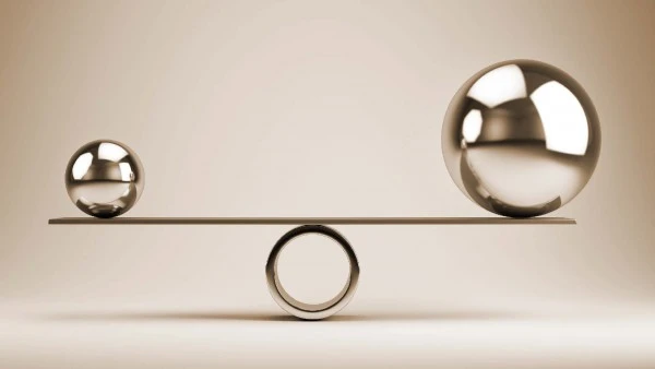 Balance constituée de deux sphères métalliques et d'une barre